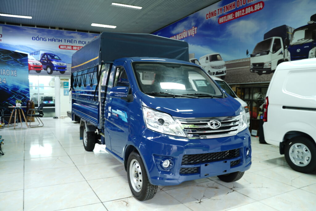 a blue truck in a building